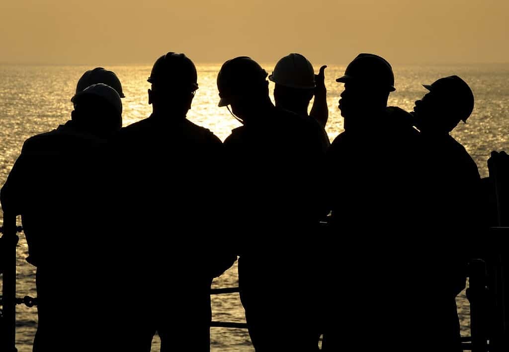 construction works in front of sunset