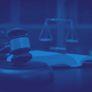 Image of court hammer linking to the legal implications of not running sickness absence management correctly.